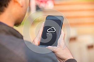 Cloud uploading concept on phone screen