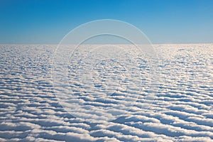 Cloud view through airplane window.