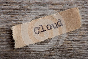 Cloud word on a piece of paper close up, business modern technology concept