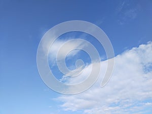 Cloude in blue sky at sunny day