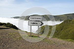 Cloudiness in the valley, signpost on parking place, Rabacal, Madeira island, Portugal