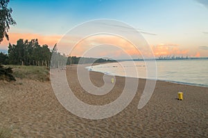 Cloudly sunrise over Baltic shore at Gorki Zachodnie in Gdansk, Poland.