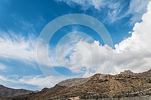 Clouds on Al Hada Mountains in Saudi Arabia photo