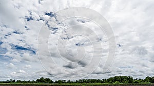 Clouds with background,sunlight through very dark clouds background of dark storm cloud