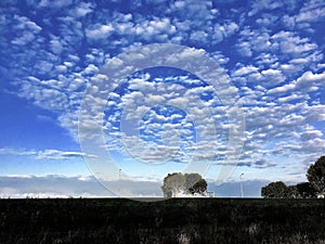 Clouds in blue sky above in Zeewolde