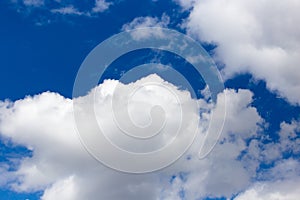 Clouds on a blue sky as a background