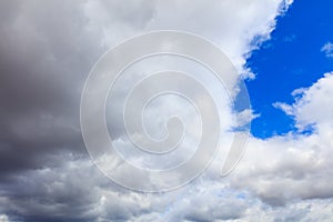 Clouds on a blue sky as a background