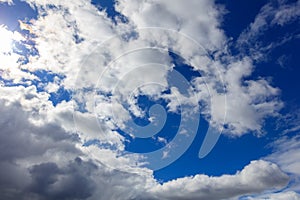 Clouds on a blue sky as a background