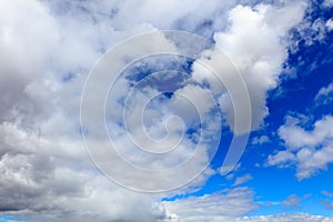 Clouds on a blue sky as a background