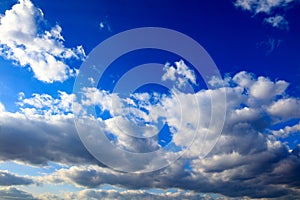 Clouds on a blue sky as a background