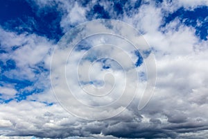 Clouds on a blue sky as a background