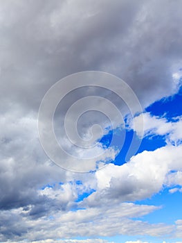 Clouds on a blue sky as a background