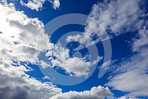 Clouds on a blue sky as a background