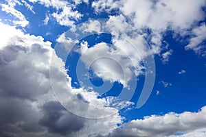 Clouds on a blue sky as a background