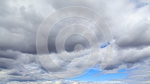 Clouds on a blue sky as a background