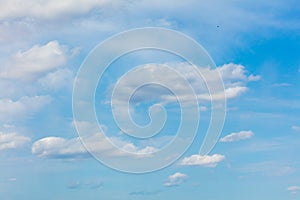 Clouds on a blue sky as a background