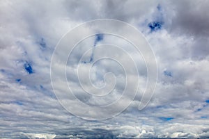 Clouds on a blue sky as a background