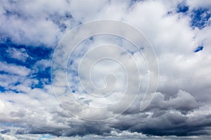 Clouds on a blue sky as a background