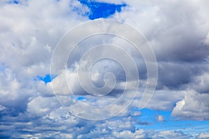 Clouds on a blue sky as a background