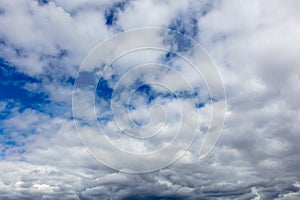 Clouds on a blue sky as a background