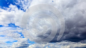 Clouds on a blue sky as a background