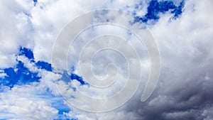 Clouds on a blue sky as a background