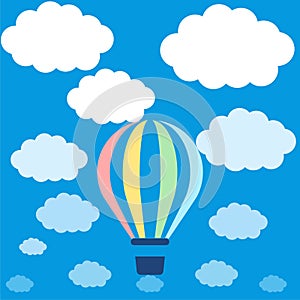 Clouds on blue sky background with hot air balloon