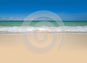 Clouds with blue sky over calm sea beach in tropical Maldives island. Tropical paradise beach with white sand.