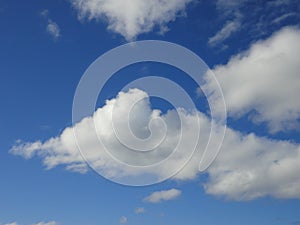 Clouds in blue sky over ocean of Hawaii