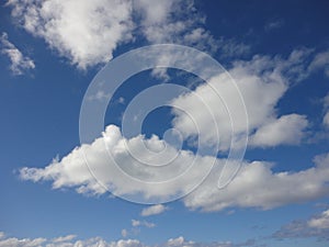 Clouds in blue sky over ocean of Hawaii