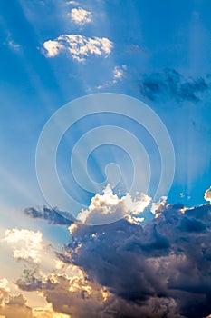 Clouds In The Blue Sky and Sun Rays