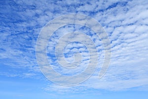 A clouds in bright blue sky as background