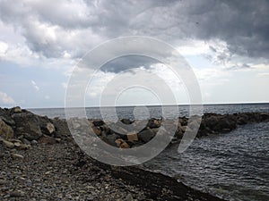 The clouds, cataclysm, coast over the Black sea beach