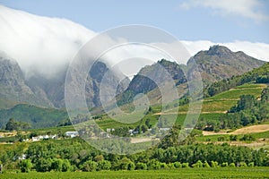 Clouds cover mountains in Stellenbosch wine region, outside of Cape Town, South Africa