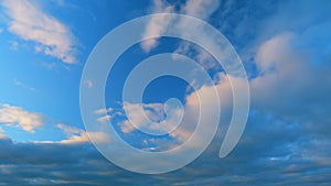 Clouds in different shades. Clouds during sunset. Panoramic view. Timelapse.