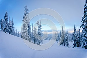 Clouds drifting in over the ski slopes at the village of Sun Peaks