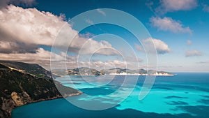 Clouds flowing over picturesque rocky coastline on Kefalonia island. Amazing footage with cloudscape and shadows on sea