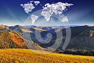 Clouds in the form of a map of the world over the mountains. autumn dawn in the Carpathians