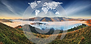 Clouds in the form of a map of the world over the mountains. autumn dawn in the Carpathians