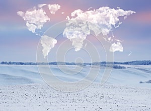 Clouds in the form of a world map over a winter field. travel and landscape concept