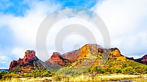 Clouds hanging over the colorful sandstone mountains at the northern edge of the Village of Oak Creek in northern Arizona