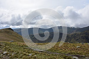 Clouds Hovering Over the Mountain Tops in England photo