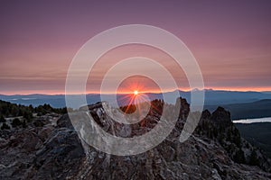 Clouds Light Purple Above Sunburst on Paulina Peak