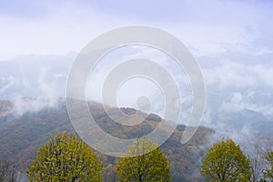 Clouds and mists over the forests and mountains of the sierra aralar in autumn, Navarra