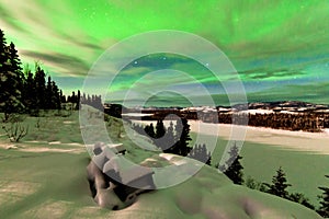 Clouds and Northern Lights over Lake Laberge Yukon photo