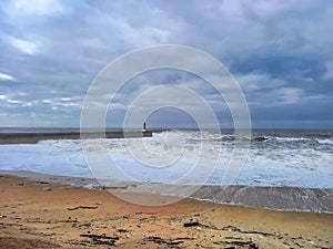 Clouds over the Carneiro Beach in Porto photo