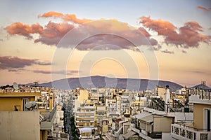 Clouds over the city of Piraeus at sunset