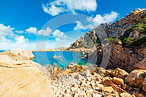 Clouds over Costa Paradiso rocky shore