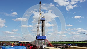 Clouds over drilling rig