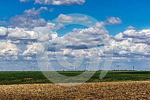 Clouds over eolian turbines